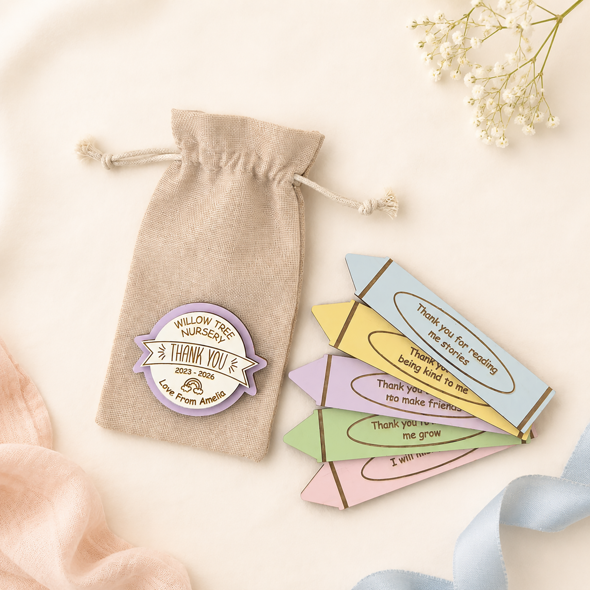 Personalised nursery thank you gift with colourful crayon tokens and drawstring bag