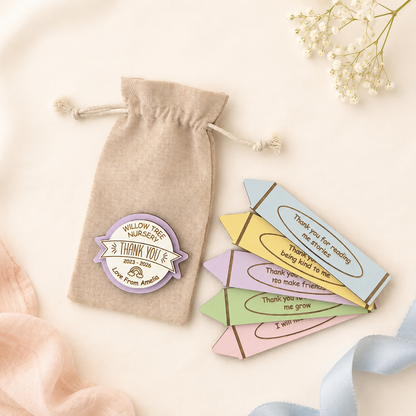 Personalised nursery thank you gift with colourful crayon tokens and drawstring bag
